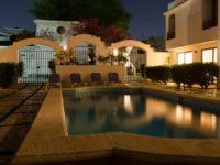 Warmly lit pool on a warm placid Mexico night