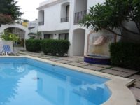 Large poolside conch fountain provides soft ambient white noise